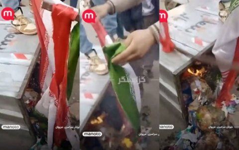 İranda etirazçılar ölkənin bayrağını zibil qutusuna atıb yandırdılar